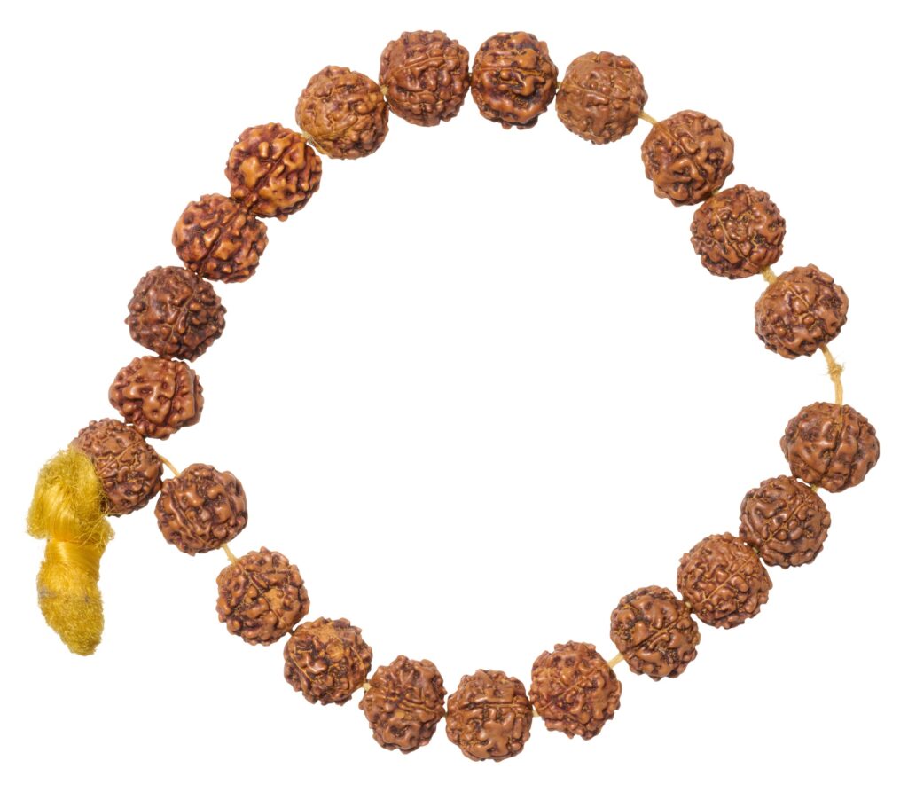 A Rudraksha bracelet made of brown beads with a yellow tassel, forming an open circle
